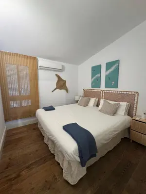 Cama o camas de una habitación en Oasis Ancla 4