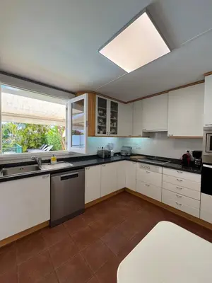 Una cocina o zona de cocina en Oasis Ancla 4