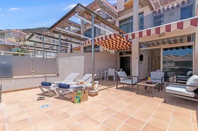 Un balcón o terraza de Cozy 2BR Retreat With Big Terrace, Peaceful Stay Minutes Away From the Beach