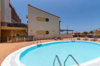 Piscina en o cerca de Cozy 2BR Retreat With Big Terrace, Peaceful Stay Minutes Away From the Beach