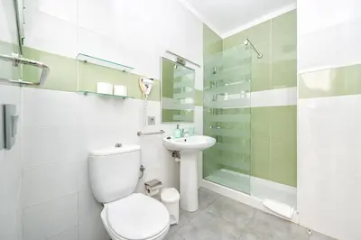 Un baño de Los Veleros Apartments