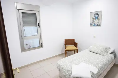 Cama o camas de una habitación en Coral Canteras Playa - Frente al mar - Ideal parejas, familias o trabajo
