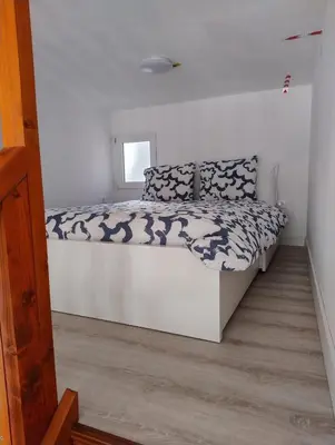 Cama o camas de una habitación en Loft noemi