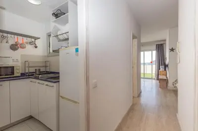 Una cocina o zona de cocina en Penthouse Turismar Loft-Terrace & OceanView