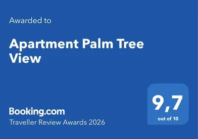 Certificado, premio, señal o documento que está expuesto en Apartment Palm Tree View