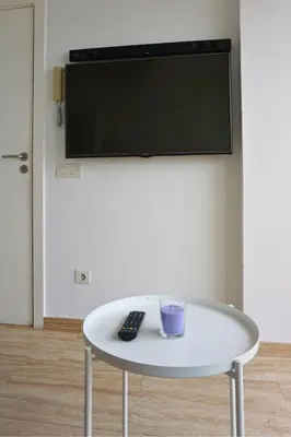 Una televisión o centro de entretenimiento en S434 Sea View Terrace