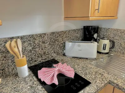Una cocina o zona de cocina en Serenity Suite Playa del Ingles