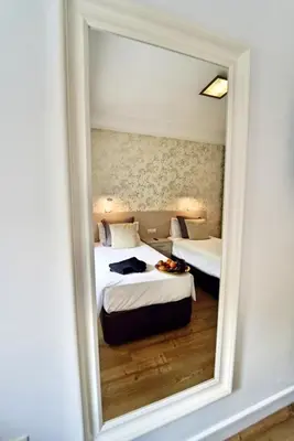 Cama o camas de una habitación en The Poet´s Corner Holiday Home