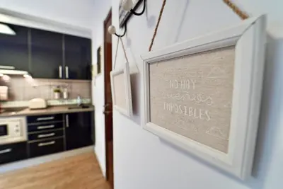 Una cocina o zona de cocina en The Poet´s Corner Holiday Home