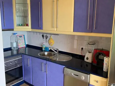 Una cocina o zona de cocina en Großzügige Ferienwohnung mit Atlantikblick in zentraler Lage Monte Rojo San Agustín