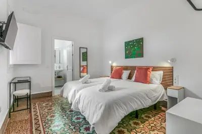 Cama o camas de una habitación en City Garden Suites Nadami 1935