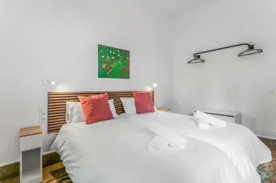 Cama o camas de una habitación en City Garden Suites Nadami 1935