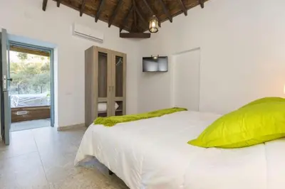 Cama o camas de una habitación en Casa Mica naturaleza y relax