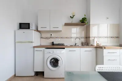 Una cocina o zona de cocina en Home2Book Charming Rooftop Vibes Apartment