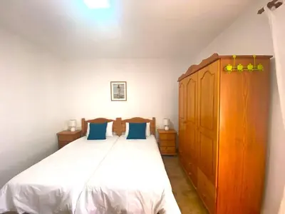 Cama o camas de una habitación en El Palomar