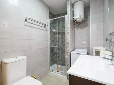 Un baño de Apartment by Playa de Las Canteras Beach