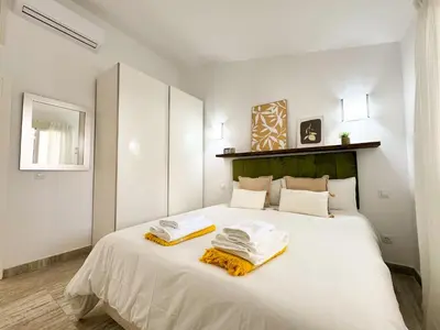 Cama o camas de una habitación en Dunes House by CanaryScape