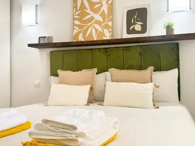 Cama o camas de una habitación en Dunes House by CanaryScape