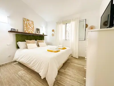 Cama o camas de una habitación en Dunes House by CanaryScape