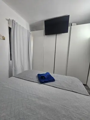Cama o camas de una habitación en ÑOQUI Maspalomas Lago 66