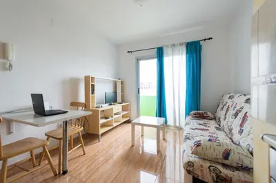Una televisión o centro de entretenimiento en Apartamento Faycan