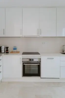 Una cocina o zona de cocina en Cozy 2-bedroom Apartment by KalmaCanaria