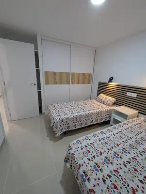 Cama o camas de una habitación en Apartamentos Anau k & L- Playa del inglés - Yumbo