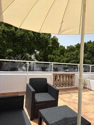 Un balcón o terraza de Casas La Aldea Suites Plaza 3
