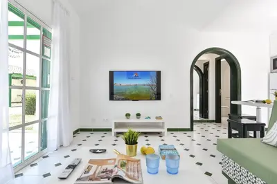 Una televisión o centro de entretenimiento en Campo Golf 68 by VillaGranCanaria