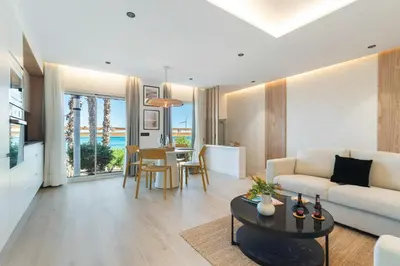 Zona de estar de Home2Book Stylish Beachfront Escape