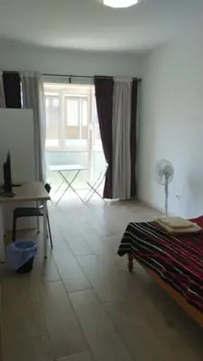 Una televisión o centro de entretenimiento en Viviendas Vacacionales SOSA REYES