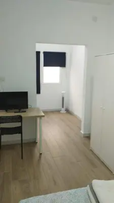 Una televisión o centro de entretenimiento en Viviendas Vacacionales SOSA REYES