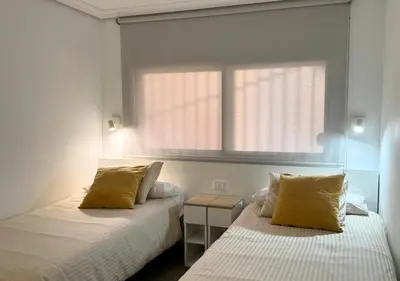 Cama o camas de una habitación en Jardín del Mar