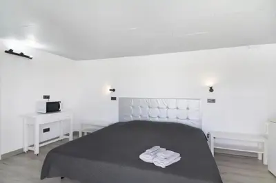 Cama o camas de una habitación en Suite con terraza y jacuzzi privada en Maspalomas