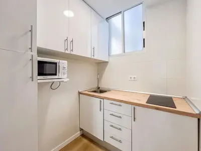 Una cocina o zona de cocina en Cozy Studio Las Canteras - 2min Walk to Beach