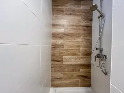 Un baño de Cozy Studio Las Canteras - 2min Walk to Beach