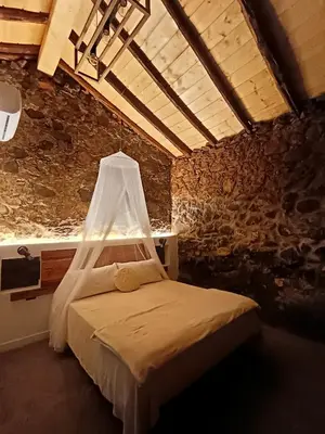 Cama o camas de una habitación en Tu rincón favorito, en Villa de Agüimes