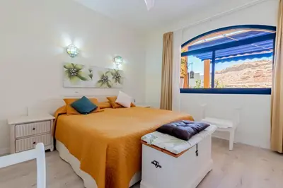 Cama o camas de una habitación en Precioso Apt Playa Taurito Mogan