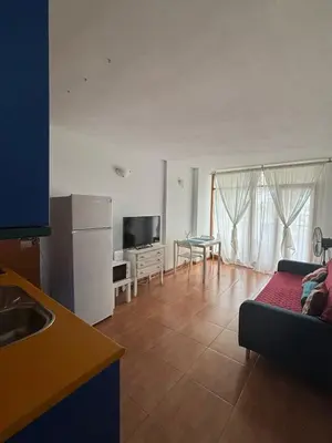 Una televisión o centro de entretenimiento en Villa Paraíso I