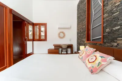 Cama o camas de una habitación en Vivelorural El Olivo de Ayagaures