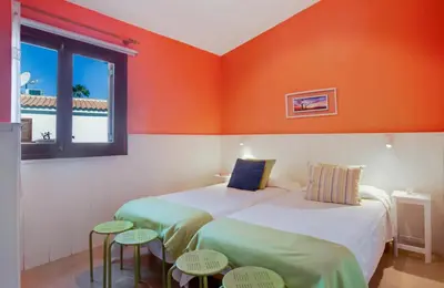 Cama o camas de una habitación en Bungalow Vegas Golf