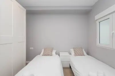 Cama o camas de una habitación en SG Simancas Plaza Apartments