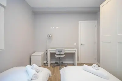 Cama o camas de una habitación en SG Simancas Plaza Apartments