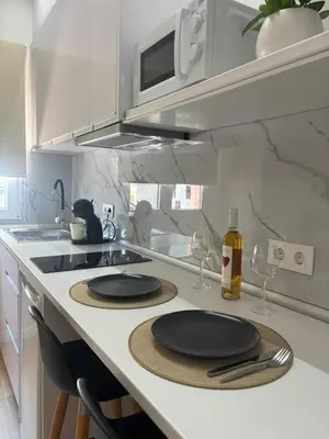 Una cocina o zona de cocina en Alojamiento MEL BEACH
