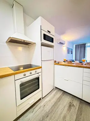 Una cocina o zona de cocina en Whisper Holiday Home