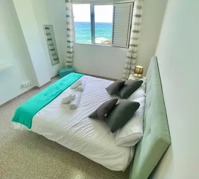 Cama o camas de una habitación en Black Rock Suit