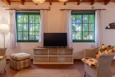 Una televisión o centro de entretenimiento en Finca Hoya de La Campana