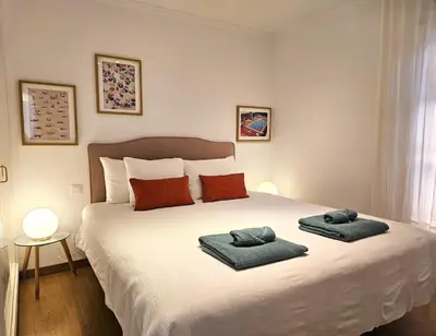 Cama o camas de una habitación en Stylish & cozy home by the beach