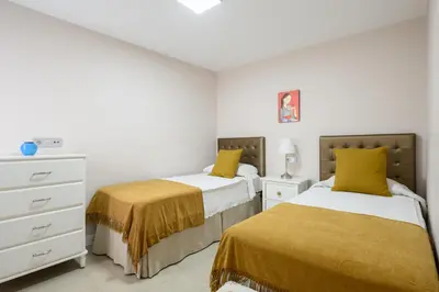 Cama o camas de una habitación en Beachfront San Agustin Papagayos III