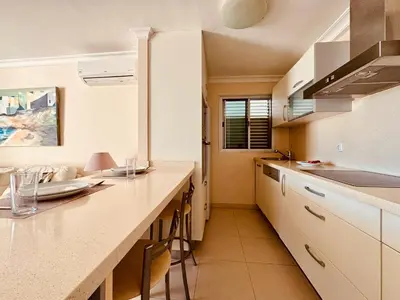 Una cocina o zona de cocina en Apartamentos las Rocas 9